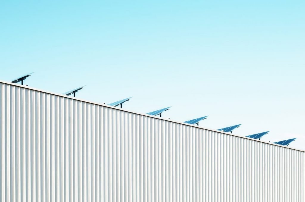 sustain advisory abstract wall with solar panels